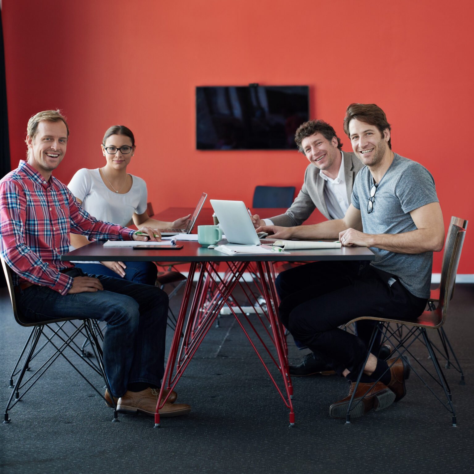 Smiling Colleagues Work Together At Table With Lap 2026 01 09 10 45 25 Utc 1536x1536